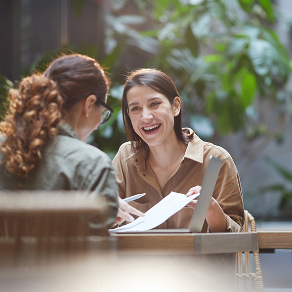 Two friendly women having a conversation.