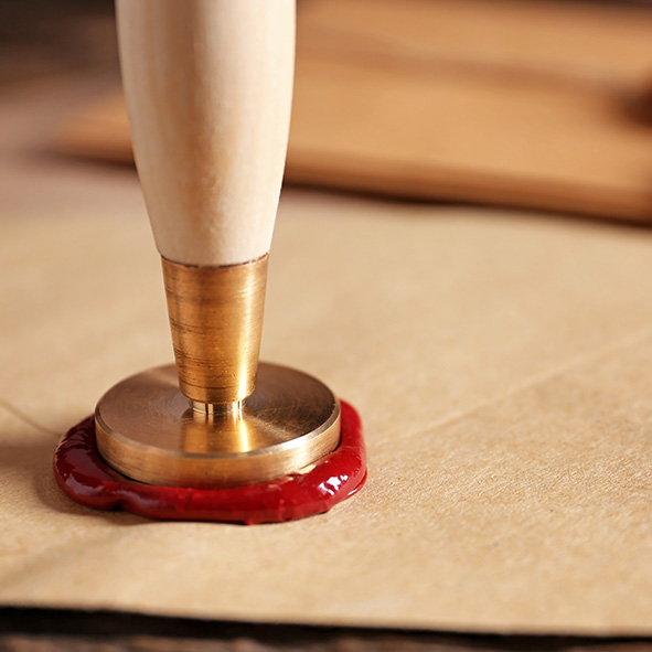 Wax seal stamp on paper.